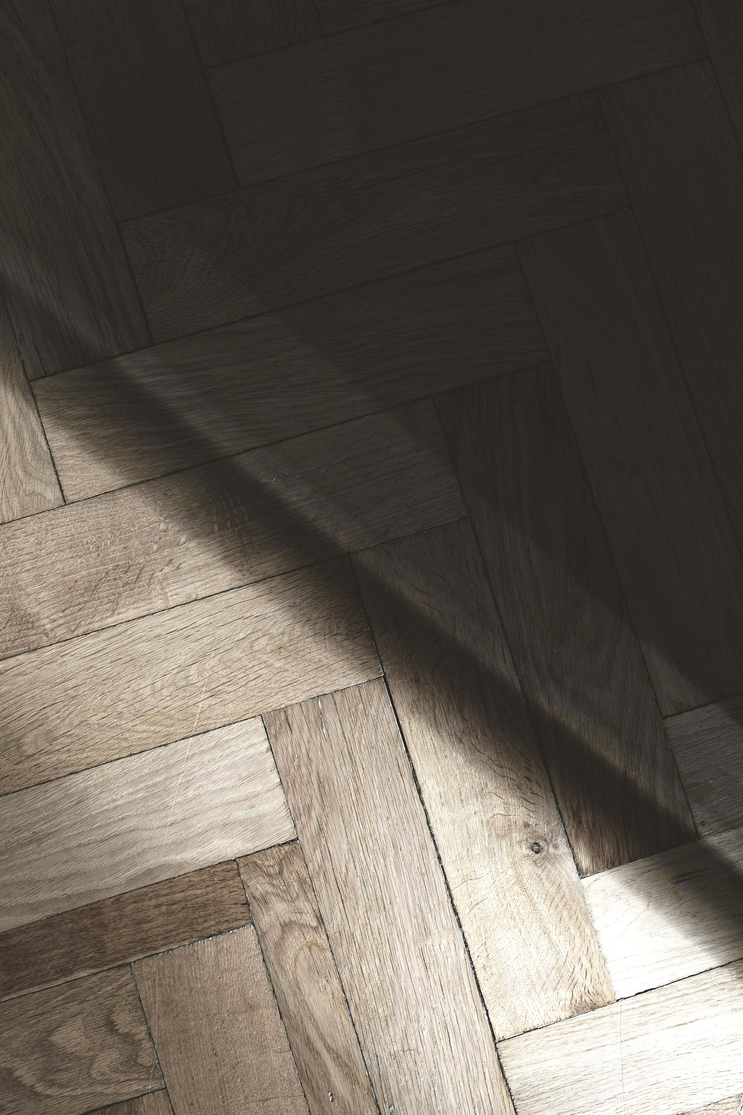 Herringbone oak floor in raking light